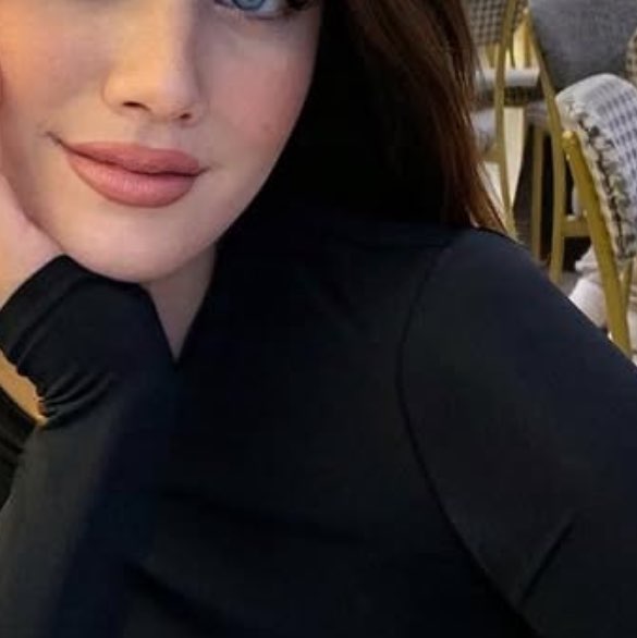 K.