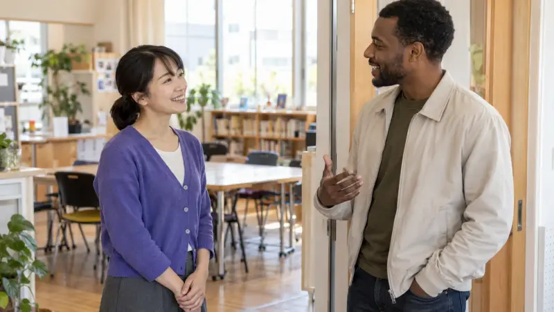 Two adults introducing themselves at a Japanese community language club